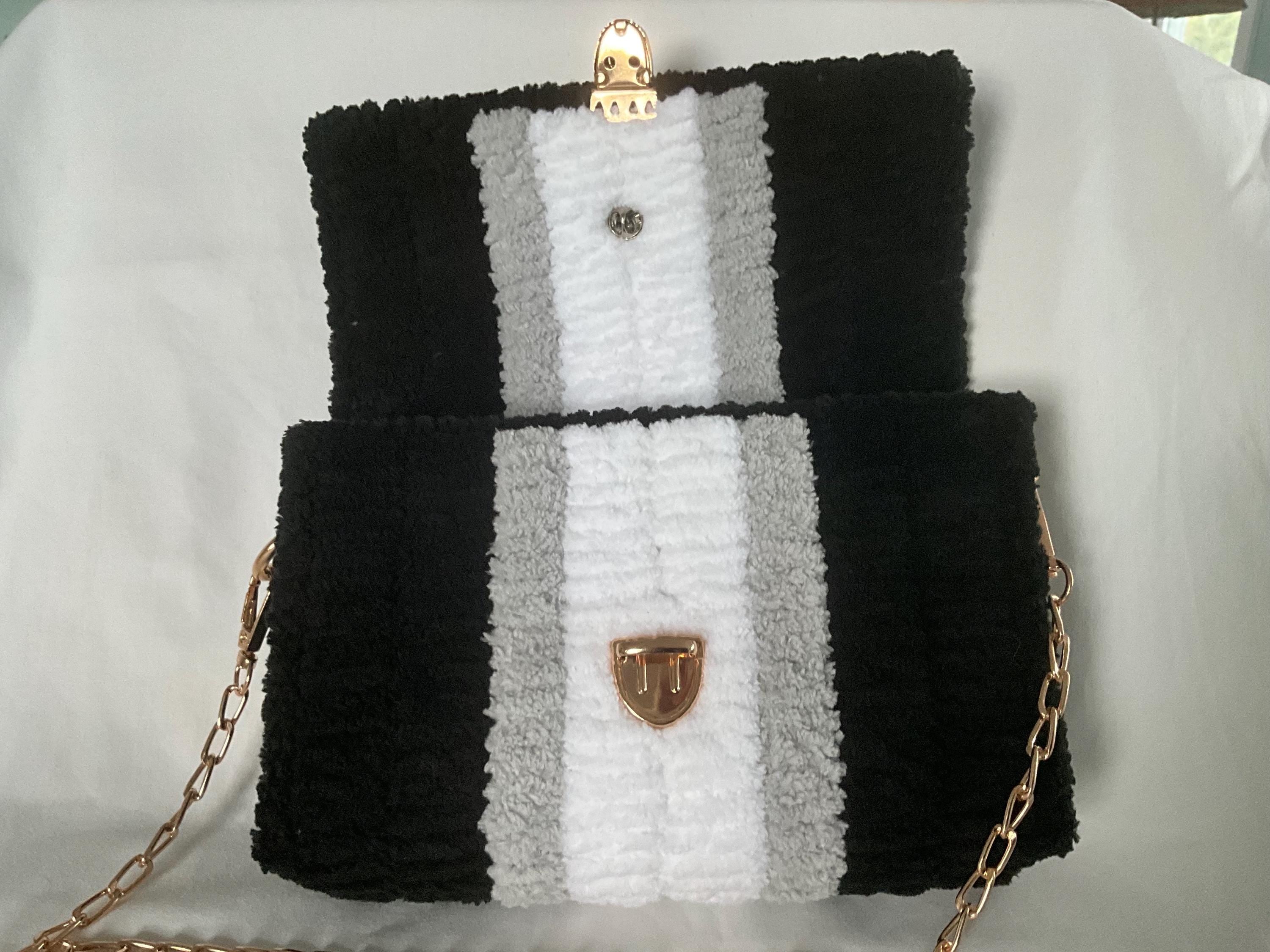 Las Vegas Raiders themed crossbody bag. Game day ready!